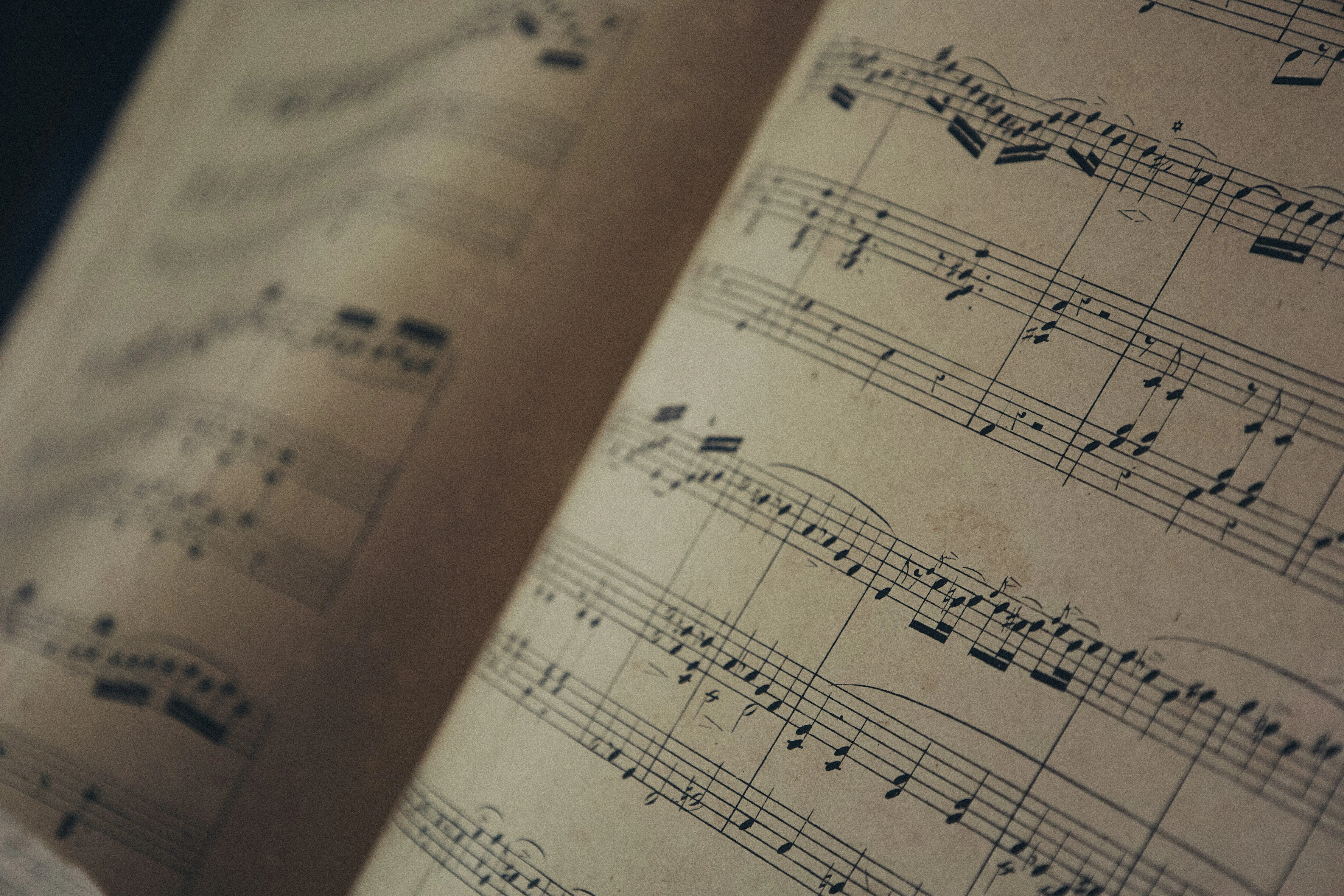 Sepia toned open book of sheet music